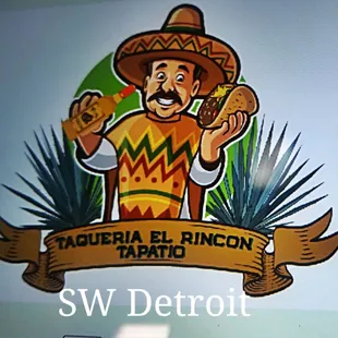 a man holding a taco