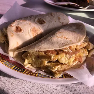 two burritos on a plate