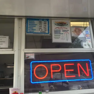 Hours and some menu items with prices