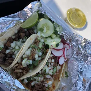 Nice people, quick service, savory, clean place! I got carnitas, barbacoa (those two were my fav) &amp; asada. Took 4-6 min to be done!