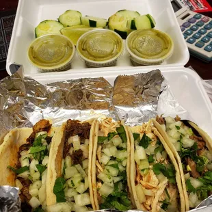 2 chicken, 2 barbacoa, and 1 al pastor taco