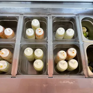 Salsa rojo and salsa verde for dine and in. Also limes.