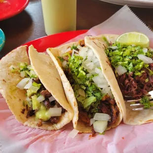 Tacos( fajita,  al pastor,  and barbacoa)