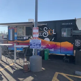 a food truck parked in a parking lot