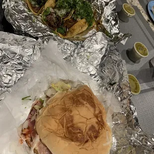 Asada tacos and chicharrón taco with a hamburguesa.  Delicious!