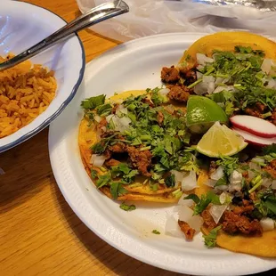 Tacos al pastor and rice. Truly some of the best al pastor I've ever eaten.