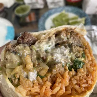 Super Burrito extra onion/cilantro, no beans. Best way to to go