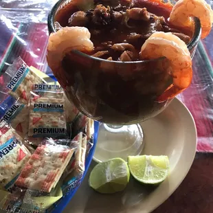a bowl of chili and shrimp