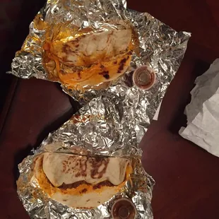 two quesadillas wrapped in foil