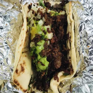 Barbacoa with cilantro and onions. I added bacon and avocado. Delish!!