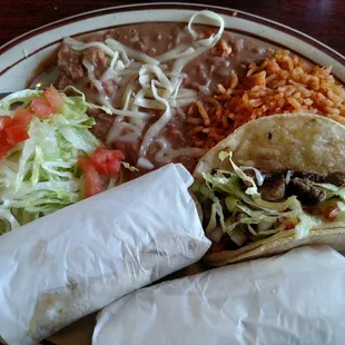 Steak taco dinner. Tacos come to the table wrapped.
