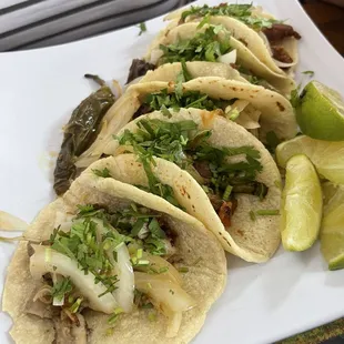 Tacos 2 barbacoa 2 tripa 1 pastor- they all were very good. Liked that you got to order the tripa just the way you want it.