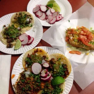 Taquitos, carne asada, al pastor and lengua tacos