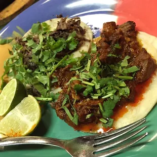Taco al pastor and barbacoa. Al Pastor was excellent. Barbacoa was ok, not a lot of seasoning.