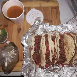 The full order of tacos mixtos (bistek and sausage). Sooo good and worth $8!