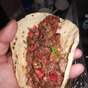 Loaded to the brim. You can easily make 2 with all the meat!