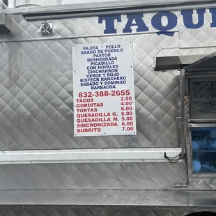 a taqueria truck parked in a parking lot