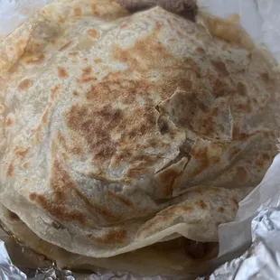 a tortilla wrapped in foil