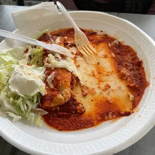 Enchiladas with the extra dry sauce around it. NO BUENO