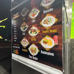 a menu on a food truck