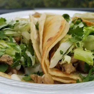 a plate of tacos