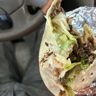 Trash super burrito. $15 for lettuce i could have sworn I ordered steak.
