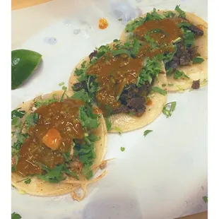 Three tacos... carne asada and chicken tacos