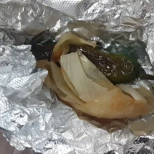 Side of grilled onion and grilled jalapeno