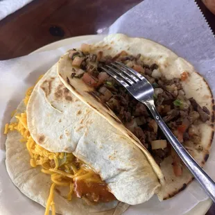 Asada La Mexicans and carne guisada with cheese