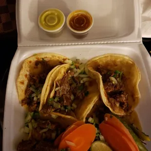 tacos in a styrofoam container