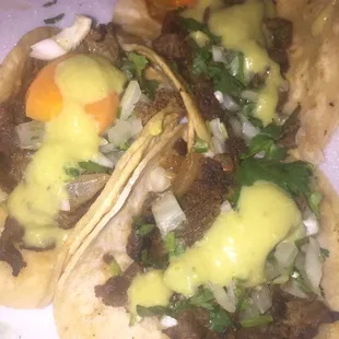 Steak tacos with green sauce