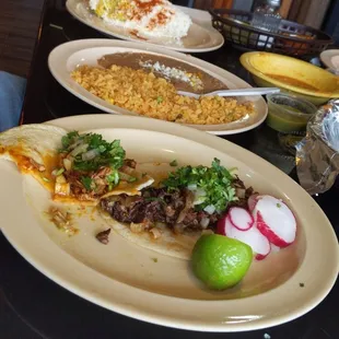 plates of tacos and rice