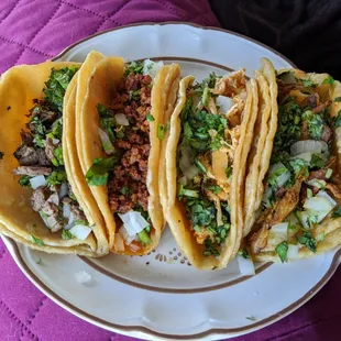 Asada, chorizo, chicken, and pastor tacos