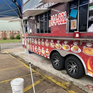 a taqueria truck parked in a parking lot