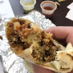 Burrito pastor.  Filler-heavy, meat-skimpy, no fresh stuff to speak of. Skip.