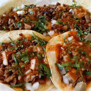 Tacos...Carne Asada (top), Al Pastor (bottom left), and Lengua (bottom right)
