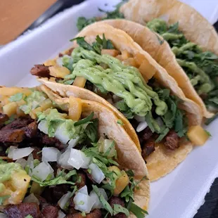 2 Al Pastor tacos and one Carne asada.