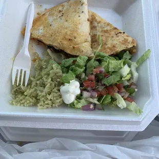 Quesadillas with cilantro rice and fresh salad toppings