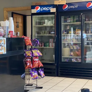 a refrigerated soda machine