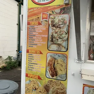 a food truck with a menu