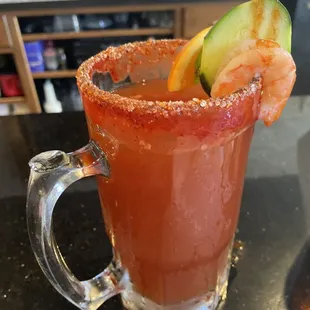 a glass of bloody cocktail