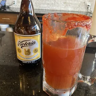 a bottle and a glass