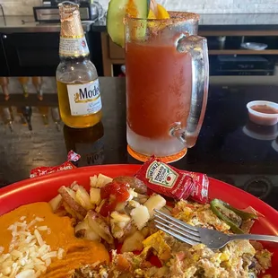 Machaca plate with a large Michelada