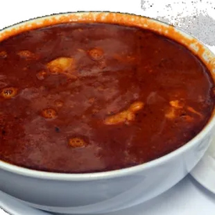 a bowl of chili and a plate of rice