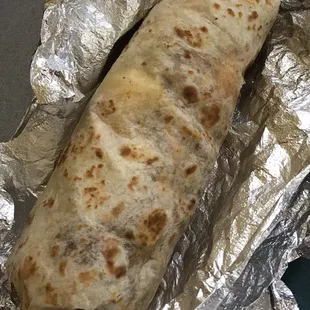 Breakfast style burrito. The eggs were scorched and tasted bad because of this。