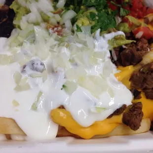 Carne Asada fries with sour cream
