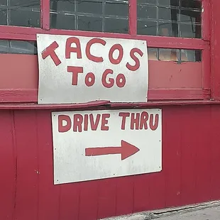 a taco's drive thru sign