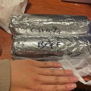 Beef and carnitas super burrito