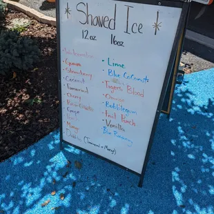 a sign for a sidewalk tree