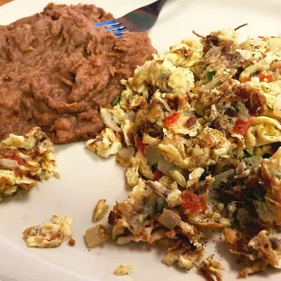 Machacado con huevo -- the shredded beef had great taste, and the 2 flour tortillas were thick and extremely fresh. $5.49.